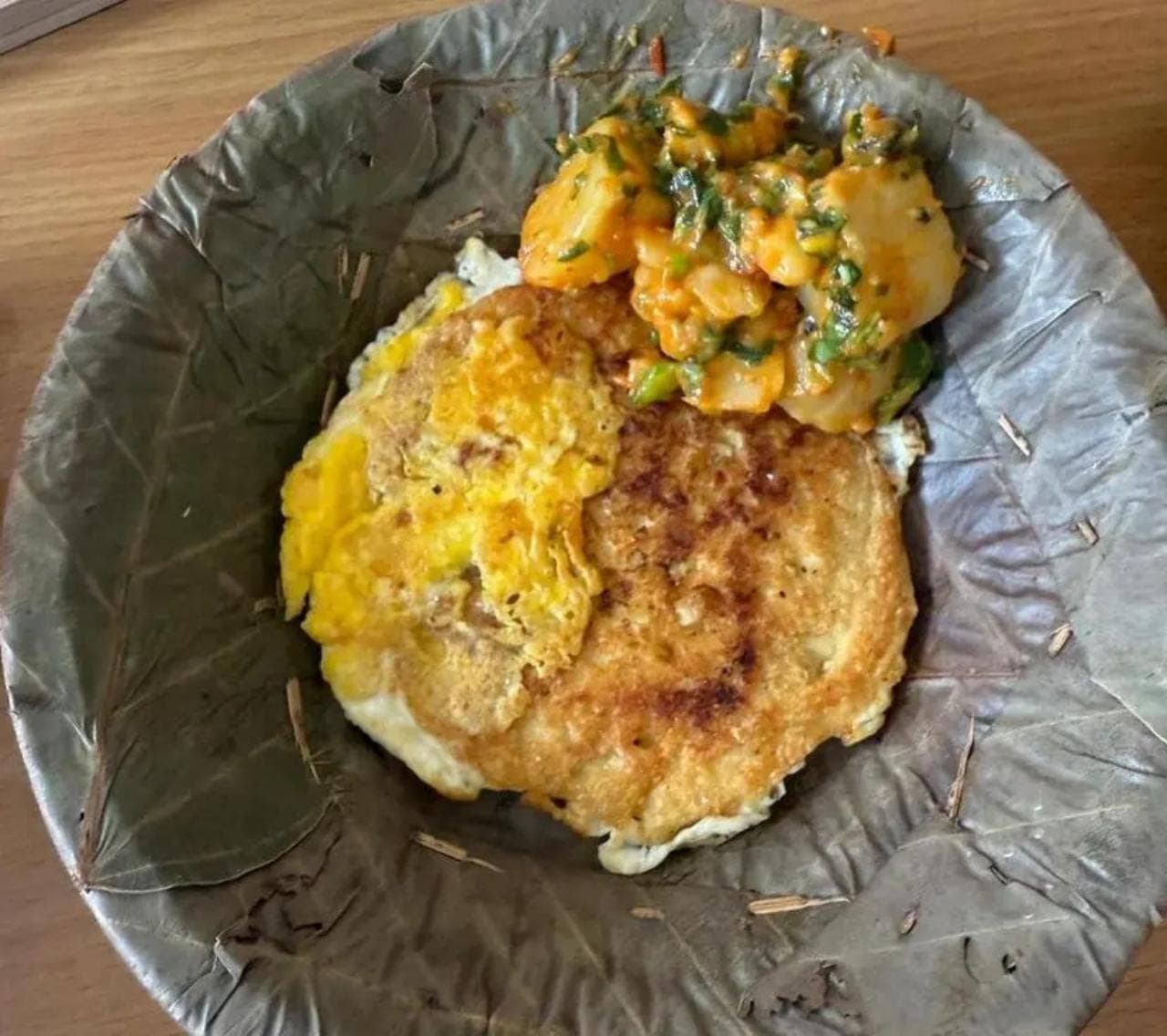 Authentic Nepali Thakali dal bhat set with rice, lentils, curry, and vegetables